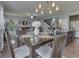 Dining area with view of living room and kitchen, perfect for entertaining or a cozy Gathering meal at 8926 New Heritage Ct, Indianapolis, IN 46239
