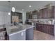Charming kitchen with granite counters, stainless appliances, island seating and plentiful storage at 8926 New Heritage Ct, Indianapolis, IN 46239