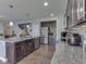 Well-equipped kitchen with island, granite countertops, stainless appliances, and ample cabinet space at 8926 New Heritage Ct, Indianapolis, IN 46239