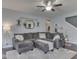Relaxing living room featuring a large sectional sofa, neutral decor, and ample space for gatherings at 8926 New Heritage Ct, Indianapolis, IN 46239