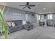 Open loft area with comfortable seating, great natural light, and view of hallway with bedrooms at 8926 New Heritage Ct, Indianapolis, IN 46239