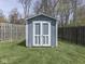 Backyard shed with double doors provides extra storage at 8926 New Heritage Ct, Indianapolis, IN 46239