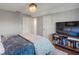 Bedroom features wood floors and a media center for relaxing and watching TV at 1016 Silver Lake Ct, Greenwood, IN 46142