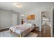 Spacious bedroom features hardwood floors, neutral paint, and stylish decor at 1016 Silver Lake Ct, Greenwood, IN 46142