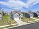 Aerial view of a two-story home with gray siding and a two-car garage at 10524 Broadford St, Indianapolis, IN 46239