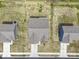 Aerial view of a roof with a gray shingle and well maintained yards and driveways at 10524 Broadford St, Indianapolis, IN 46239