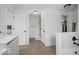 Bright bathroom featuring a tiled floor, vanity, and walk-in shower with a glass door at 10524 Broadford St, Indianapolis, IN 46239