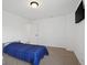 Clean bedroom with carpet, mounted television, and neutral decor, creating a relaxing atmosphere at 10524 Broadford St, Indianapolis, IN 46239