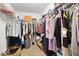Spacious walk-in closet with ample hanging space and shelving, perfect for organizing clothes and accessories at 10524 Broadford St, Indianapolis, IN 46239