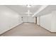 A spacious, unfinished basement with carpet flooring and recessed lighting at 1121 Retford Ct, Greenwood, IN 46143