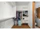 Organized walk-in closet with shelves and hanging space for wardrobe storage and accessibility at 1121 Retford Ct, Greenwood, IN 46143