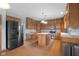 Expansive kitchen with stainless steel appliances, ample counter space, and a center island at 1121 Retford Ct, Greenwood, IN 46143