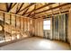 Interior of home under construction, showing window, exposed studs, and natural light at 11625 Rolling Springs Dr, Carmel, IN 46033