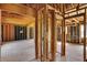 View of interior framing, showing construction and open layout potential at 11625 Rolling Springs Dr, Carmel, IN 46033