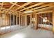 Open floor plan with exposed framing and studs, ready for customization and design at 11625 Rolling Springs Dr, Carmel, IN 46033