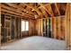 Spacious unfinished interior, exposed wood framework, and natural light ideal for renovation and design projects at 11625 Rolling Springs Dr, Carmel, IN 46033