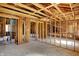 Expansive interior space with exposed wood framing, offering a blank canvas for customization at 11625 Rolling Springs Dr, Carmel, IN 46033