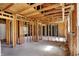 Unfinished living room highlighting the wooden framing, and the wiring at 11625 Rolling Springs Dr, Carmel, IN 46033