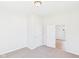 Neutral bedroom featuring carpet, light walls and trim, and standard closet doors at 1217 W 6Th St, Anderson, IN 46016