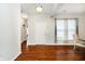Welcoming entryway with hardwood floors, neutral paint, and a view into the main living space at 1315 Hazy Falls Blvd, Westfield, IN 46074