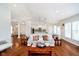 Inviting living room featuring an open layout, hardwood floors, and ample natural light at 1315 Hazy Falls Blvd, Westfield, IN 46074