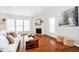Spacious living room featuring a fireplace, hardwood floors, and plenty of natural light at 1315 Hazy Falls Blvd, Westfield, IN 46074