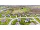 An aerial view of single Gathering homes showcases the neighborhood's landscaping and design at 1334 Winfield Way, Greenwood, IN 46143