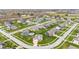 Aerial image displaying a residential area with large homes and green landscaping at 1334 Winfield Way, Greenwood, IN 46143