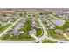 Aerial photo highlighting a residential community with well-spaced homes and green spaces at 1334 Winfield Way, Greenwood, IN 46143