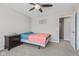 Inviting bedroom featuring a ceiling fan, carpeted floor, and ample natural light at 1334 Winfield Way, Greenwood, IN 46143