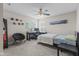 Bedroom with ceiling fan, workstation, carpet floors, and wall decor, offering a comfortable space at 1334 Winfield Way, Greenwood, IN 46143