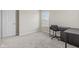 Bedroom featuring carpet flooring, a black desk, and bright windows providing natural light at 1334 Winfield Way, Greenwood, IN 46143