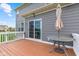 View from the deck showcasing the home's exterior and an outdoor seating area at 1334 Winfield Way, Greenwood, IN 46143