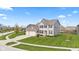 Charming two-story home with a manicured lawn and attached two car garage at 1334 Winfield Way, Greenwood, IN 46143