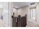 Second floor hallway showcasing neutral tones, leading to various rooms, blending style and functionality at 1334 Winfield Way, Greenwood, IN 46143