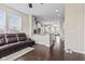 View from living room into kitchen, with hardwood floors and lots of natural light at 1334 Winfield Way, Greenwood, IN 46143