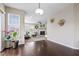 View of the bright living room with fireplace from the dining area, showcasing open floor plan at 1334 Winfield Way, Greenwood, IN 46143