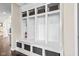Mudroom with storage cubbies, coat hooks and bench seat with baskets at 1334 Winfield Way, Greenwood, IN 46143