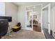 The office transitions through glass doors to reveal a dining area, enhancing its versatility at 1334 Winfield Way, Greenwood, IN 46143