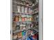 Organized pantry with wire shelving, stocked with a variety of food items in clear containers at 1334 Winfield Way, Greenwood, IN 46143