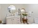 Well-lit bathroom with ornate mirror, vanity and unique decorative accents at 1502 N Matthews Rd, Greenwood, IN 46143