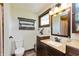 Full bathroom featuring tiled vanity and a wooden shelving unit at 1502 N Matthews Rd, Greenwood, IN 46143