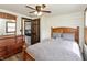 Charming bedroom with wood accents, hardwood floors, and a neutral color scheme at 1502 N Matthews Rd, Greenwood, IN 46143