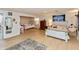 Bright bedroom with hardwood floors, two bed areas and natural lighting at 1502 N Matthews Rd, Greenwood, IN 46143