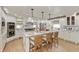 Gourmet kitchen with custom cabinets, marble countertops, and professional-grade appliances at 1502 N Matthews Rd, Greenwood, IN 46143