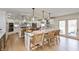 Bright and airy kitchen featuring a large central island and stainless steel appliances at 1502 N Matthews Rd, Greenwood, IN 46143