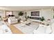 Bright living room with comfortable seating, fireplace, and stylish decor for relaxation and entertaining at 1502 N Matthews Rd, Greenwood, IN 46143