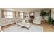 Bright living room featuring hardwood floors and comfortable seating area at 1502 N Matthews Rd, Greenwood, IN 46143