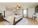 Bedroom featuring hardwood floors, decorative rug, and comfortable bed at 1502 N Matthews Rd, Greenwood, IN 46143