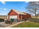 Exterior view of detached garage on property with adjacent fenced area at 1502 N Matthews Rd, Greenwood, IN 46143